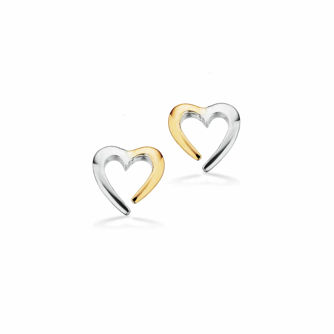 Hjerte ørestikker i en blanding af guld og sølv. Øreringene er fra det danske smykkebrand Scrouples.  