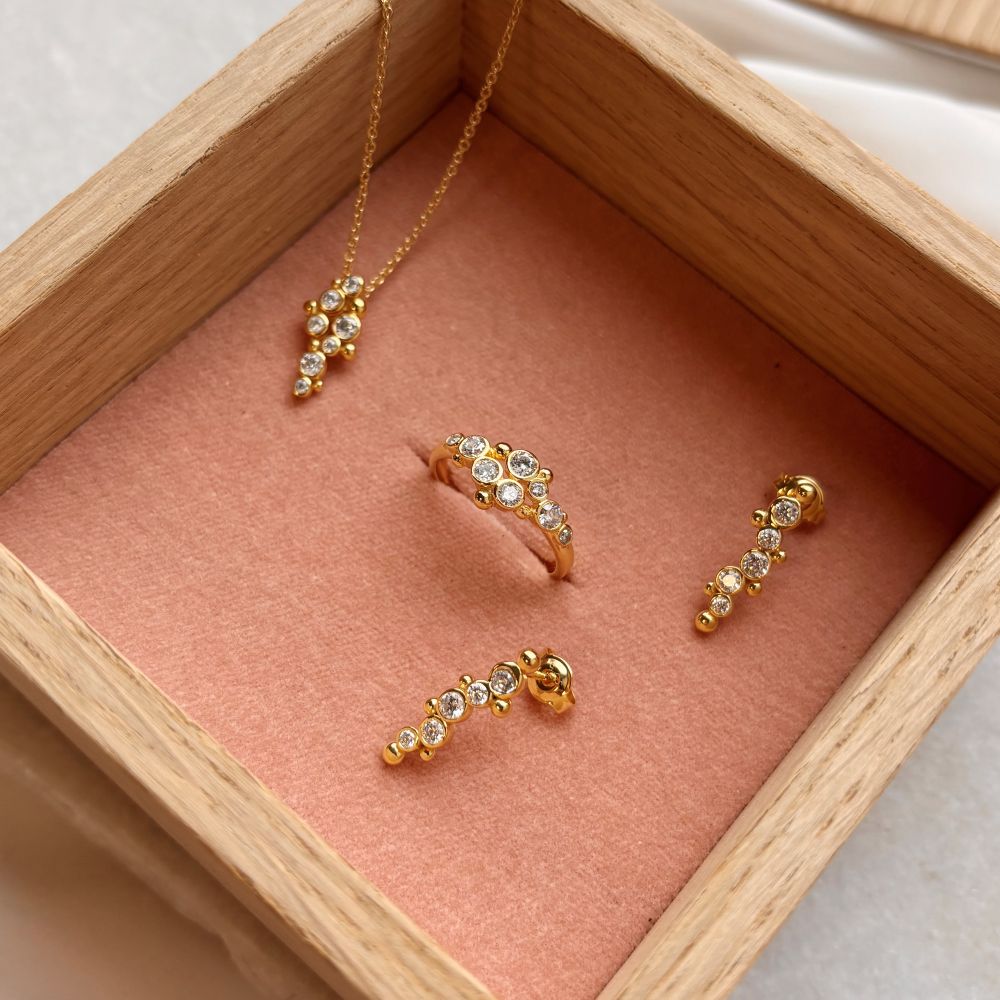 forgyldt ørestikker smykke sæt