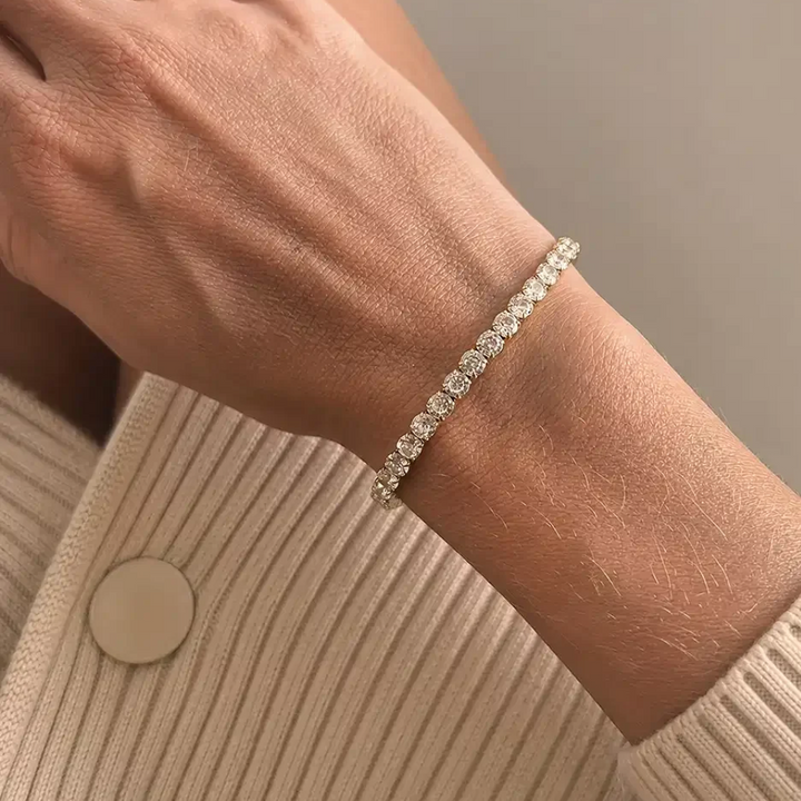Molly - Tennisarmbånd i guldfarvet stål med krystaller - st30101a,m